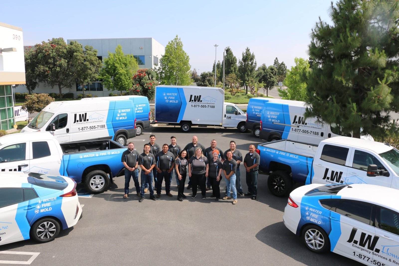 JW Home Care team with the company restoration fleet